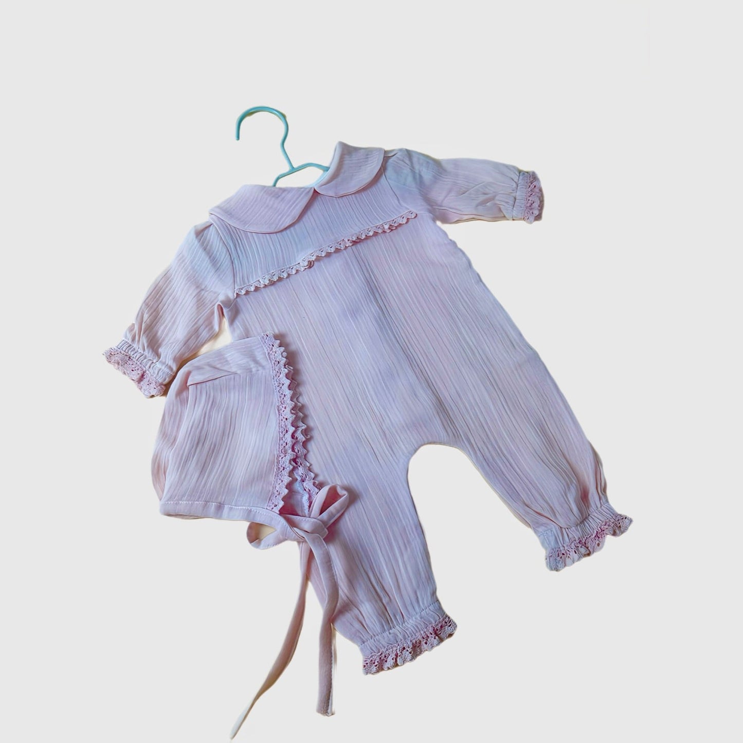 pink baby girl newborn first outfit with bonnet