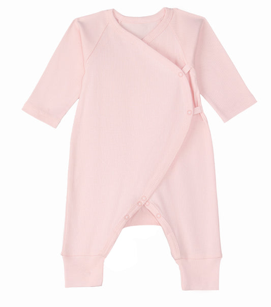 Pink baby romper on a white background