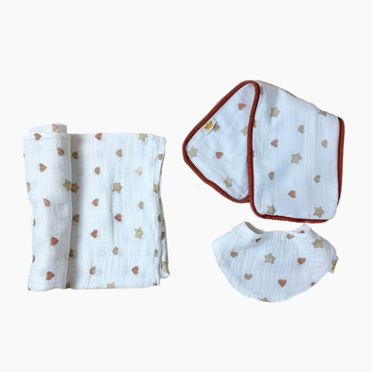 Baby swaddle blanket with heart and star patterns on a white background